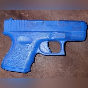 Glock 26 replica blue gun.